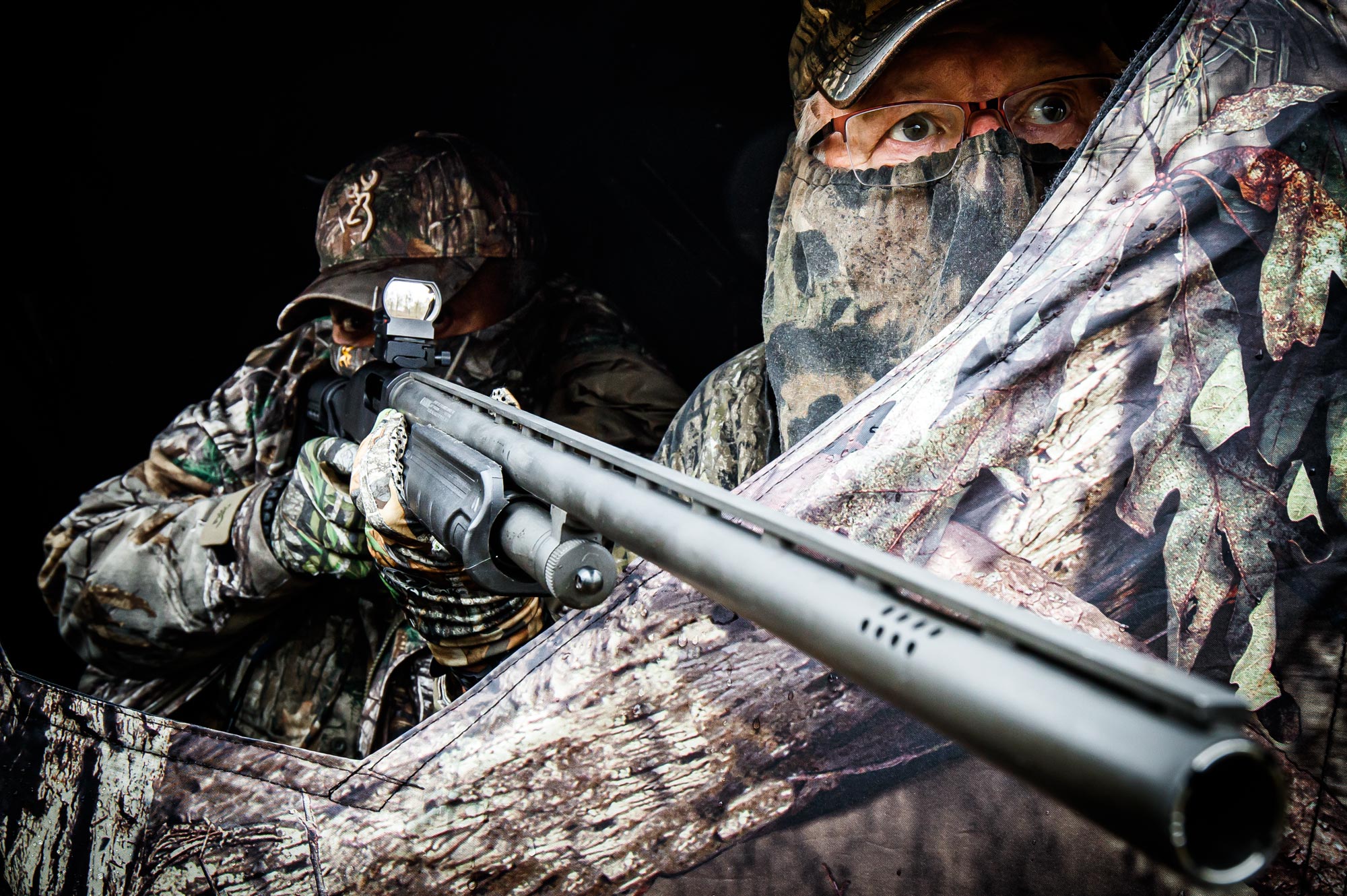 two turkey hunters in a blind