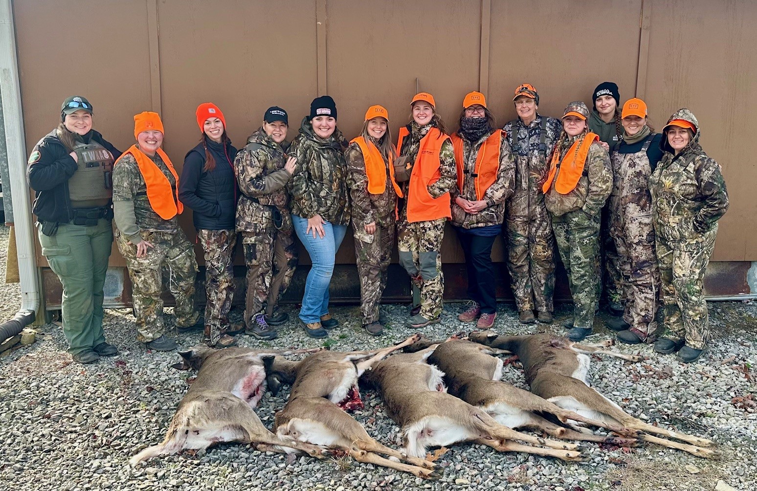 Group picture of WITO hunters with harvested deer